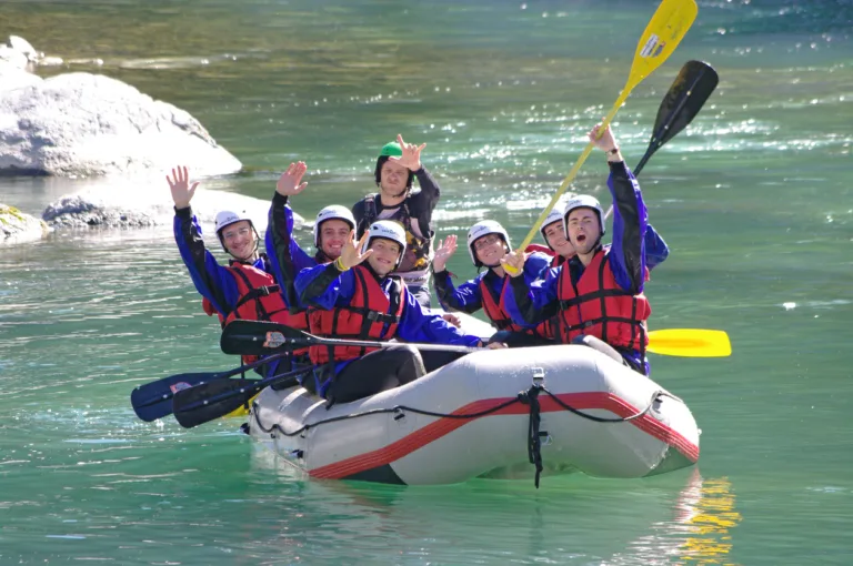 Varallo Sesia, Italy - July 18, 2010: A group of men and women enjoy a rafting center down the Sesia river in Italy