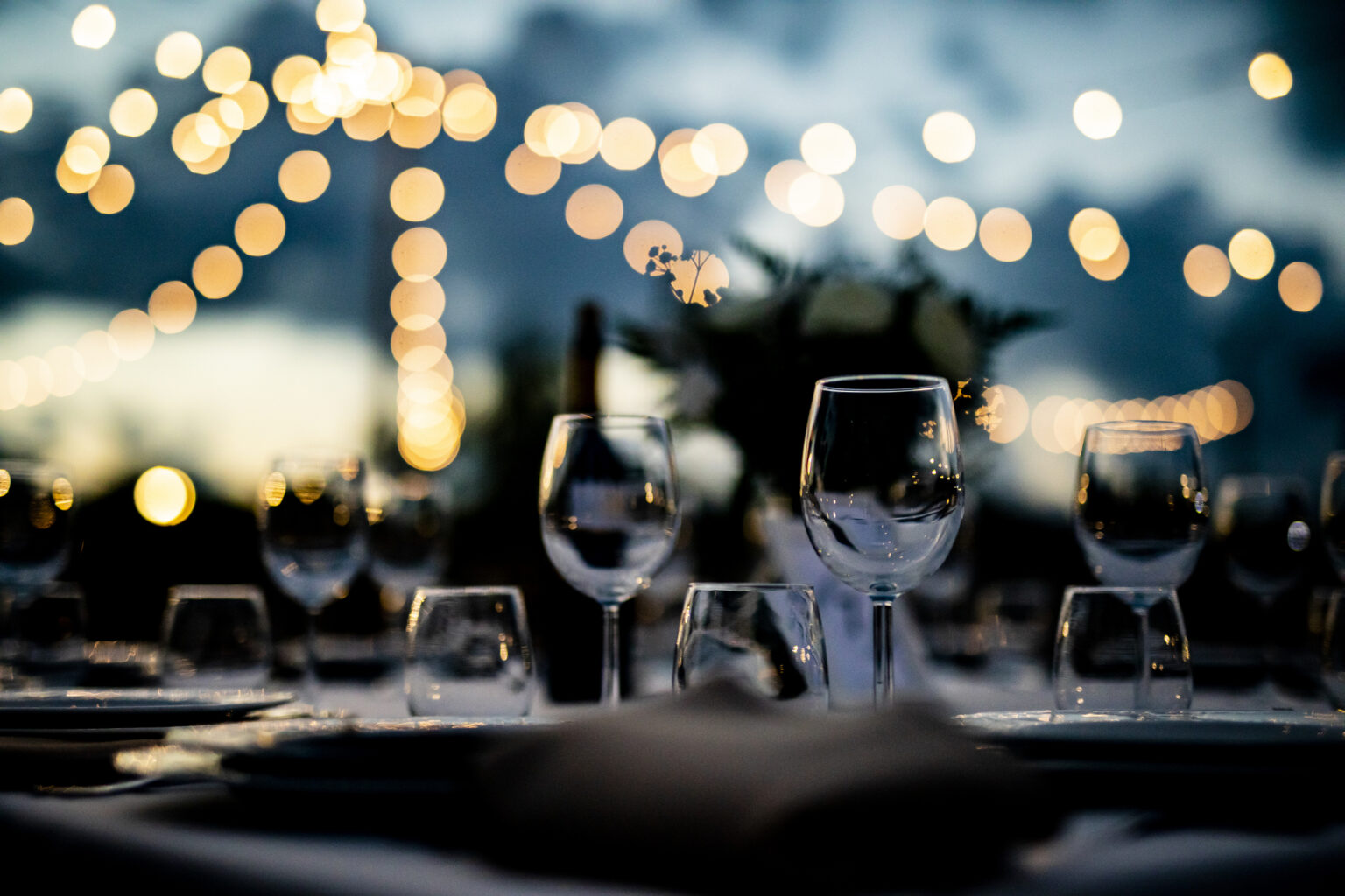 Luxury table settings for fine dining with and glassware, beautiful blurred background. For events, weddings. props for weddings, birthdays, and celebration. Wedding, restaurant, xmas 2020, 2021